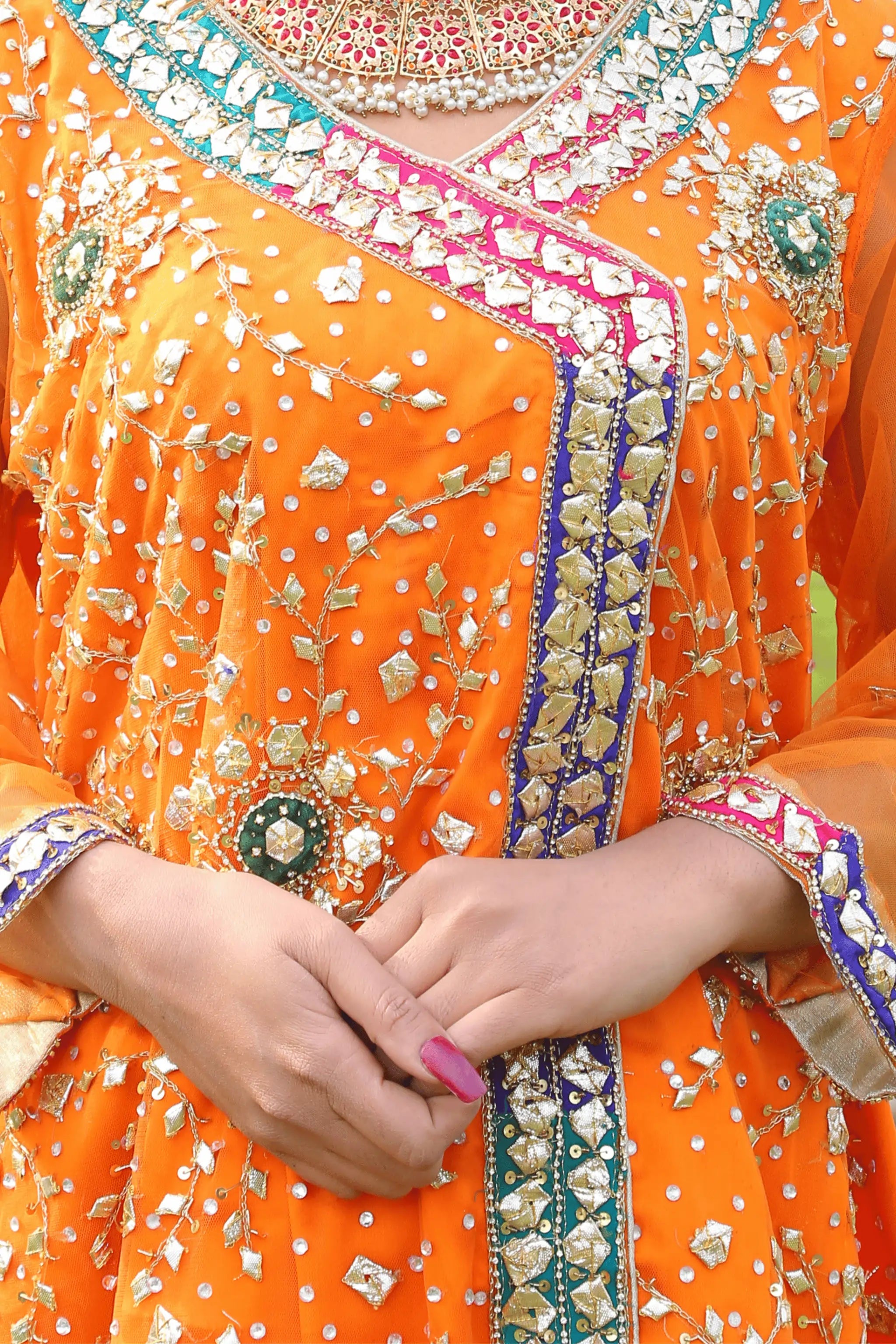 Amber Dusk couture festive outfit showcasing organza shirt bead and star embellishment detailing