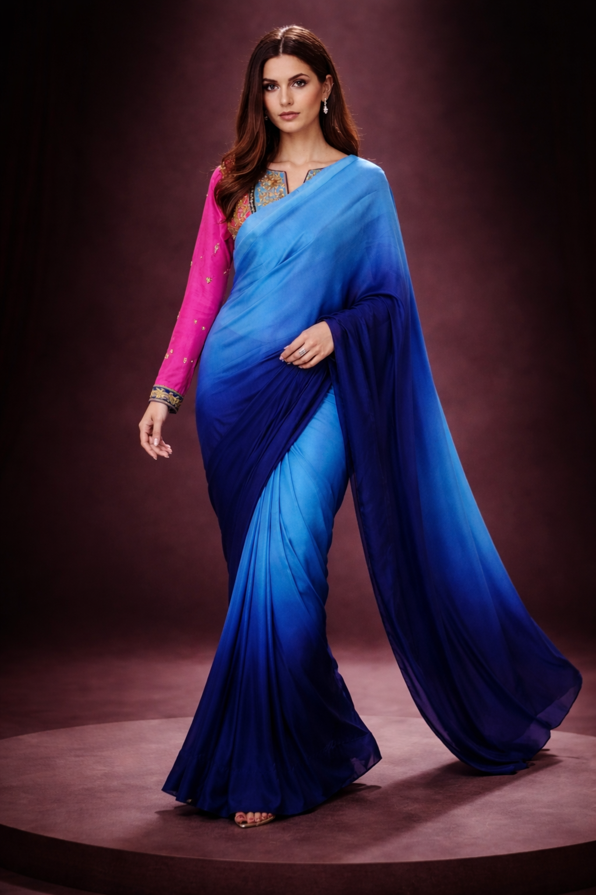 Full_view_of_Whisper_Korean_silk_saree_draped_elegantly_styled_with_embroidered_raw_silk_blouse_in_pink_and_blue2
