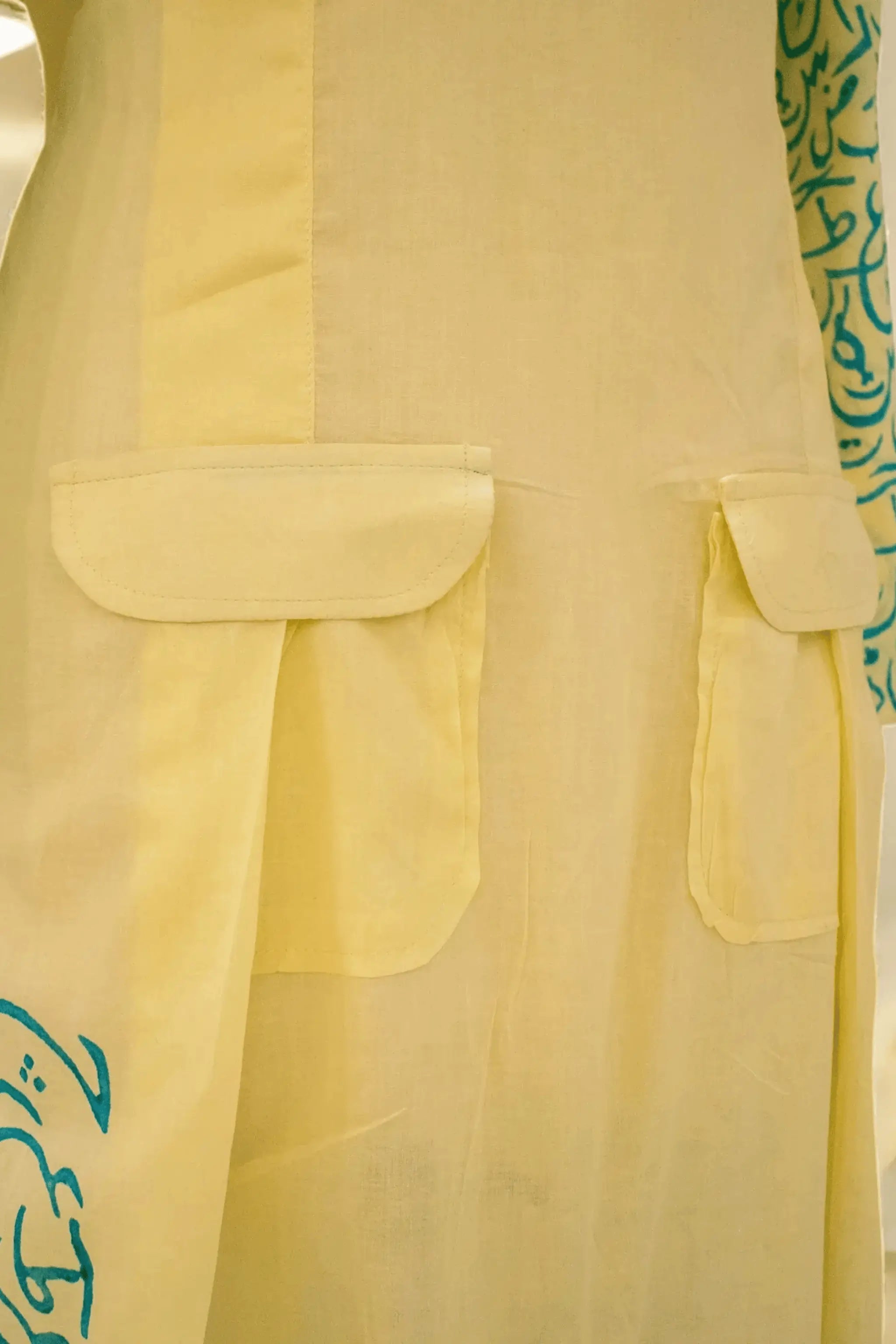 Gold Sand luxury lawn shirt showcasing calligraphy print and button detailing