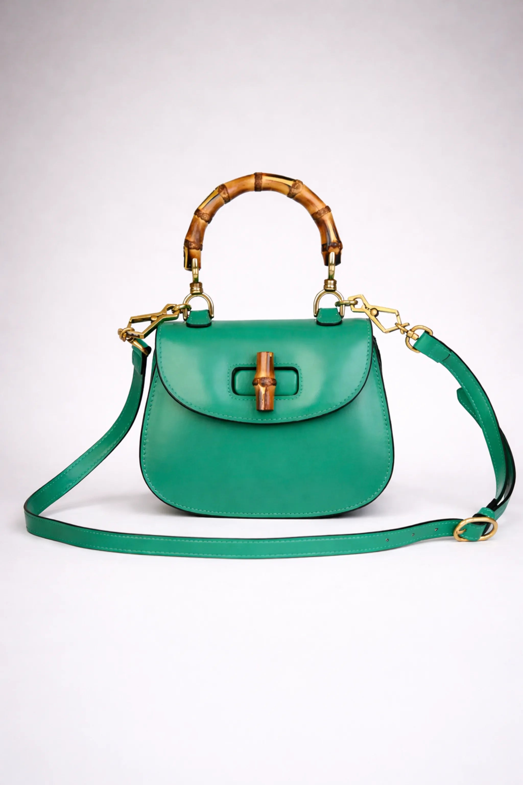 Green structured PU handbag with top handle and zip closure