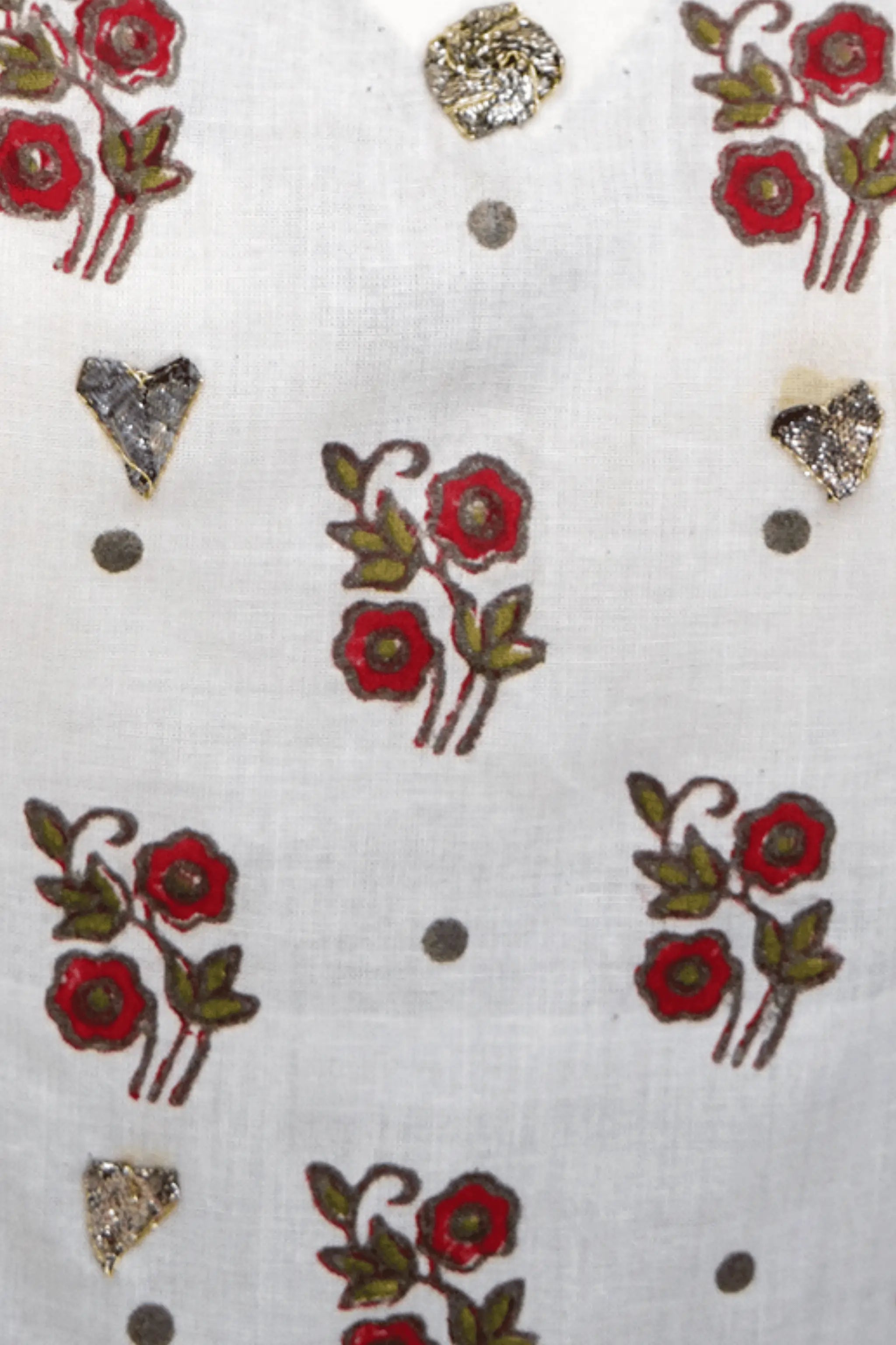 Gulzaar – block print detailing on off-white & red flared frock — close-up