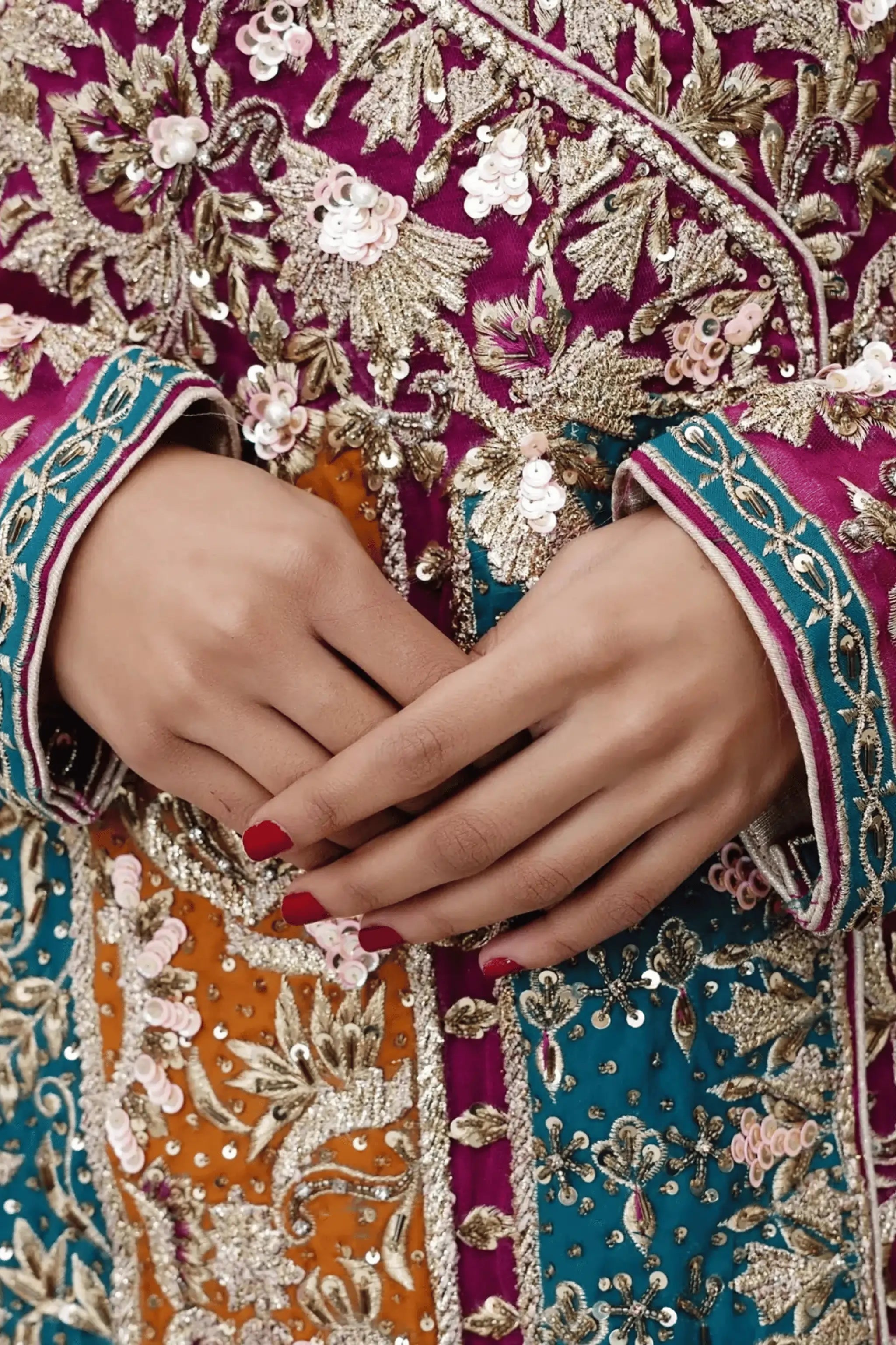 Heavily embroidered raw silk sleeves with ornate cuff detailing