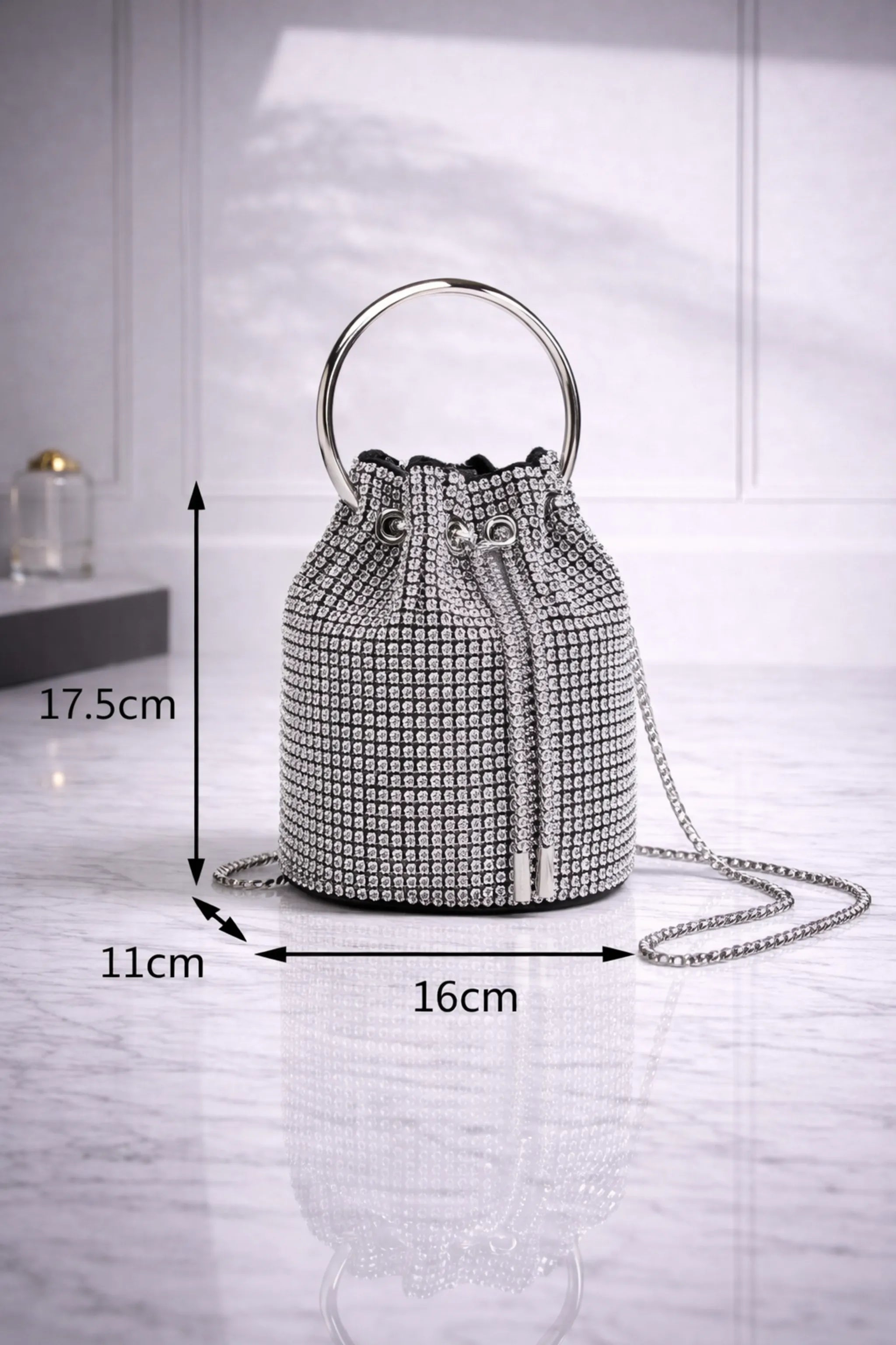 Luxury rhinestone drawstring bucket bag with chain strap – studio shot