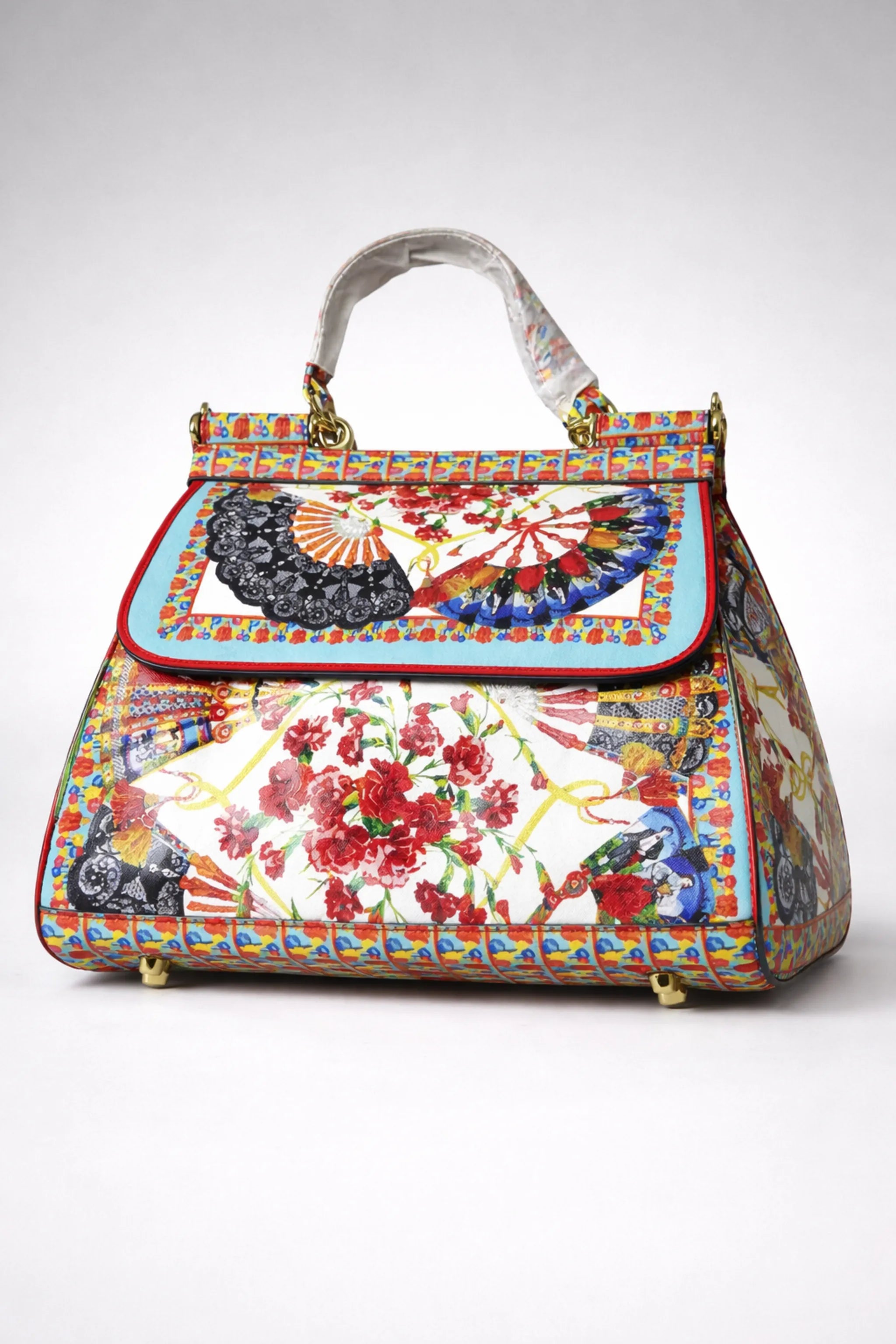 Side view of multicolour floral printed women’s handbag
